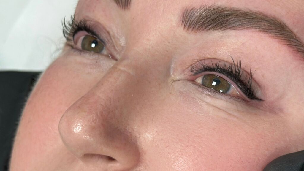 Permanent eyeliner treatment provides defined eye enhancement with long-lasting results.